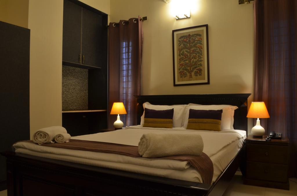 Luxtay Suites Bangalore Ruang foto