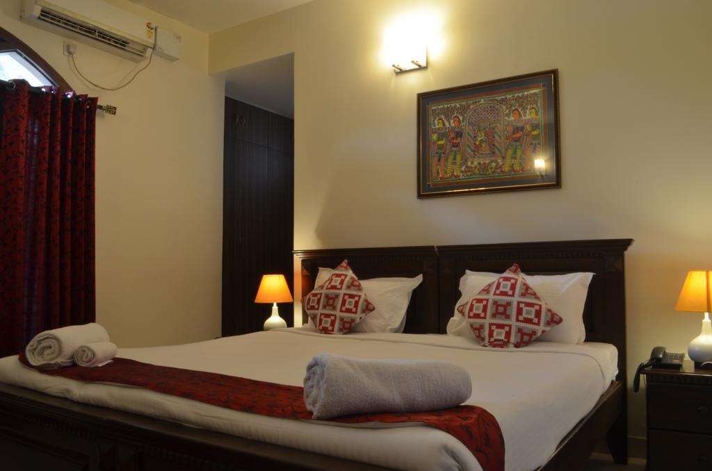 Luxtay Suites Bangalore Ruang foto