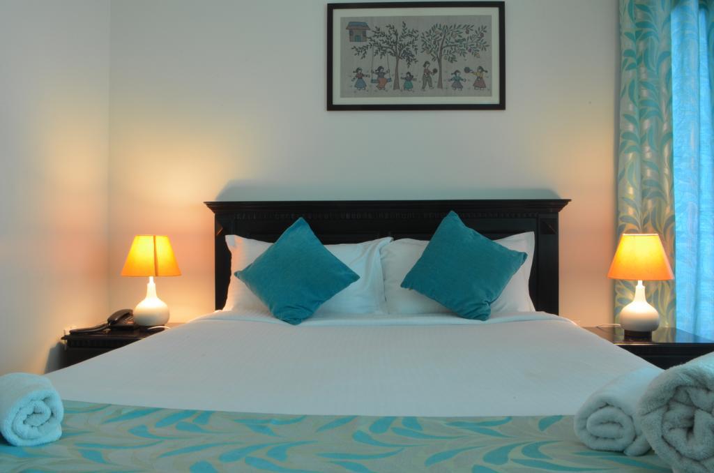 Luxtay Suites Bangalore Ruang foto
