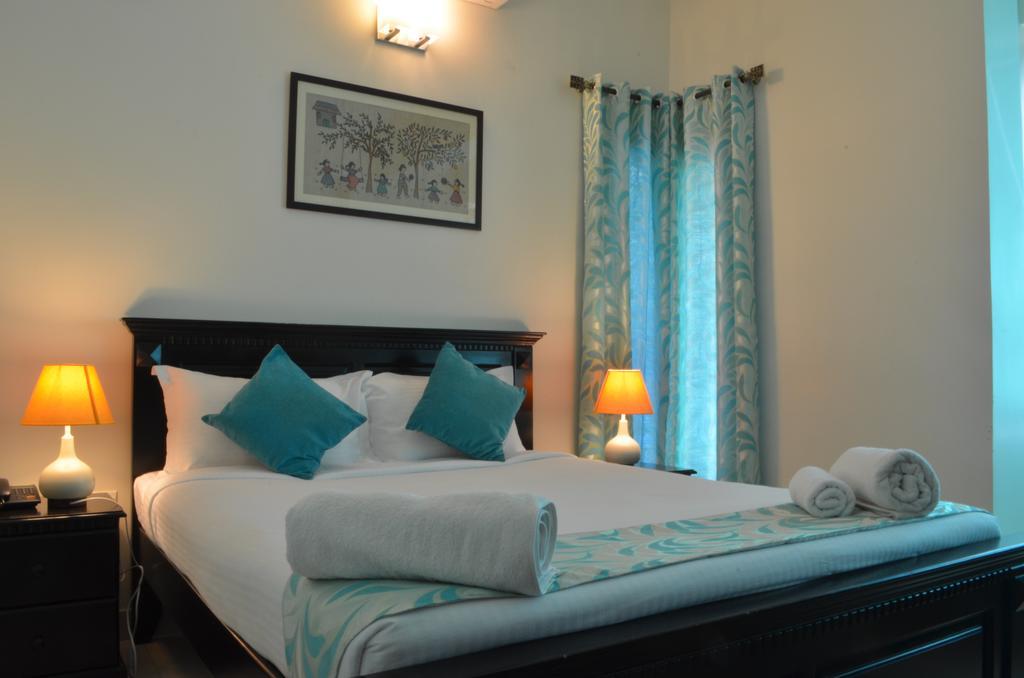 Luxtay Suites Bangalore Ruang foto
