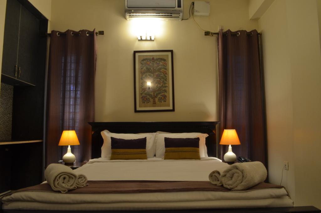 Luxtay Suites Bangalore Ruang foto